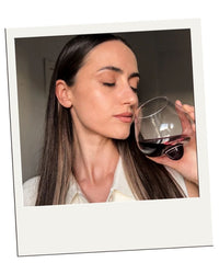 Polaroid-style customer review – EQUILO No.2 glass being held by Anna R.