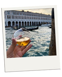 Polaroid-style customer review – EQUILO No.1 glass being held in Venice by Ricky W.
