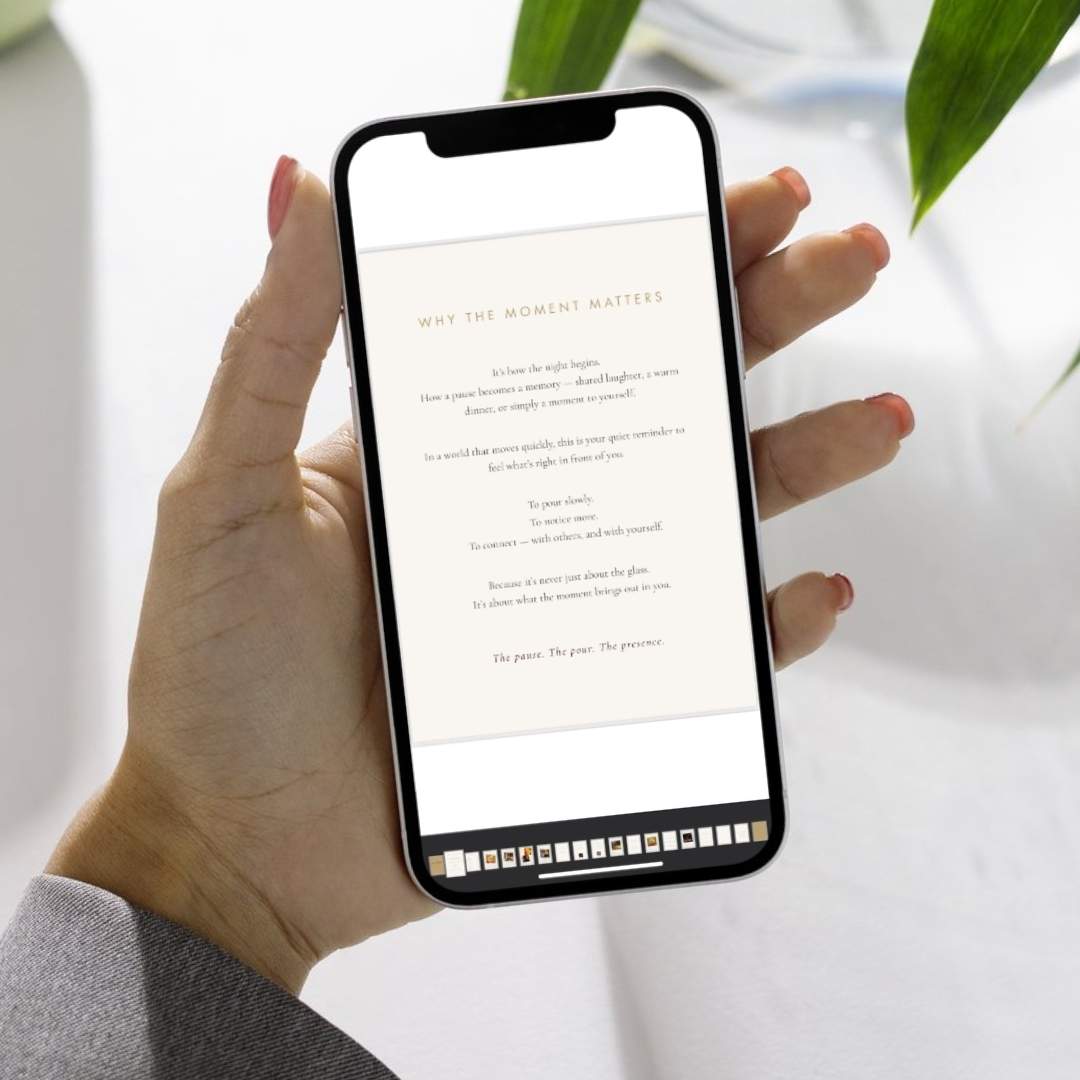 The Art of the Moment sample page on  mobile device being held.