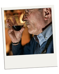 Polaroid-style customer review – EQUILO No.2 glass being held to drink by Tony D.